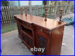 Antique (1870s) Victorian hand carved sideboard with beveled mirror topper