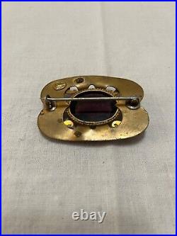 Antique brass hand wrought Victorian purple bevel set stone brooch signed C&R
