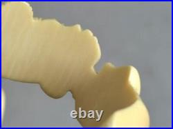 Antique hand carved cuff braclet two African heads man woman 19th c original