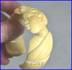 Antique hand carved cuff braclet two African heads man woman 19th c original