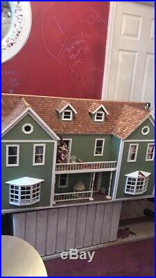 Hand built Victorian Doll House. Green with white trim and brown roof