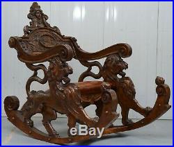 Italian Circa 1850 Fruitwood Restored Hand Carved Lion & Cherub Rocking Armchair