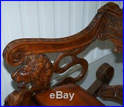 Italian Circa 1850 Fruitwood Restored Hand Carved Lion & Cherub Rocking Armchair