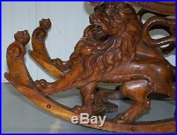 Italian Circa 1850 Fruitwood Restored Hand Carved Lion & Cherub Rocking Armchair