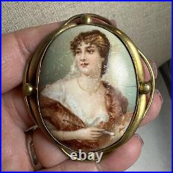 Large hand painted Victorian porcelain portrait brooch gold toned