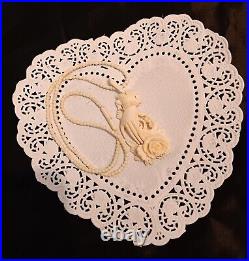 Necklace Victorian Rose in Hand Love Token or Memento Mori Hand Carved Bovine