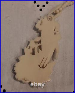 Necklace Victorian Rose in Hand Love Token or Memento Mori Hand Carved Bovine