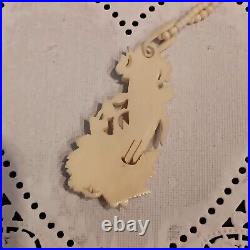 Necklace Victorian Rose in Hand Love Token or Memento Mori Hand Carved Bovine