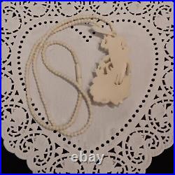 Necklace Victorian Rose in Hand Love Token or Memento Mori Hand Carved Bovine