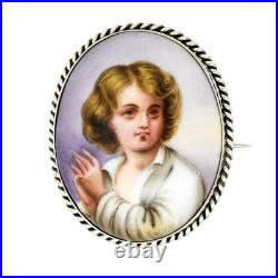 Victorian hand-painted porcelain portrait boy brooch, twisted rope silver frame