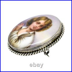 Victorian hand-painted porcelain portrait boy brooch, twisted rope silver frame