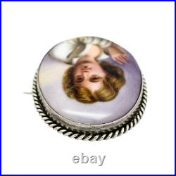 Victorian hand-painted porcelain portrait boy brooch, twisted rope silver frame