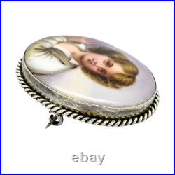 Victorian hand-painted porcelain portrait boy brooch, twisted rope silver frame